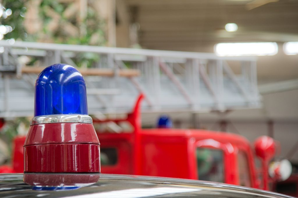 A picture showing a close up of the blue light of an emergency vehicle, a reminder that London properties need fire alarm certificates