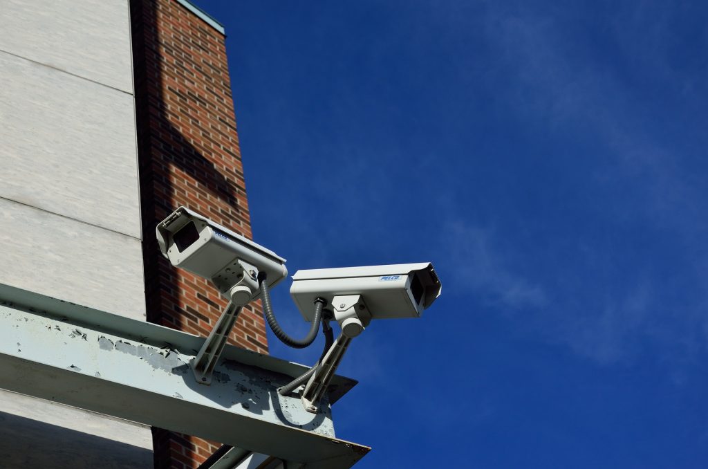 A close up of two CCTV cameras, part of an electrical installation in London